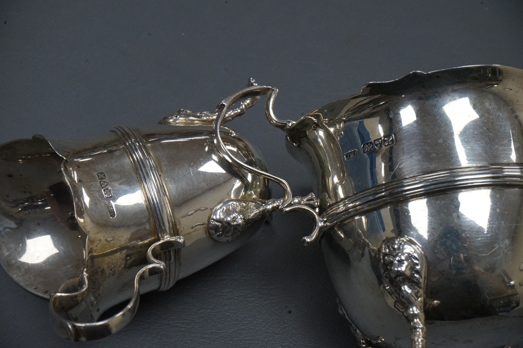 An Edwardian silver two handled sugar bowl and matching cream jug, by John Milward Banks, Chester, 1908, 13.6oz.